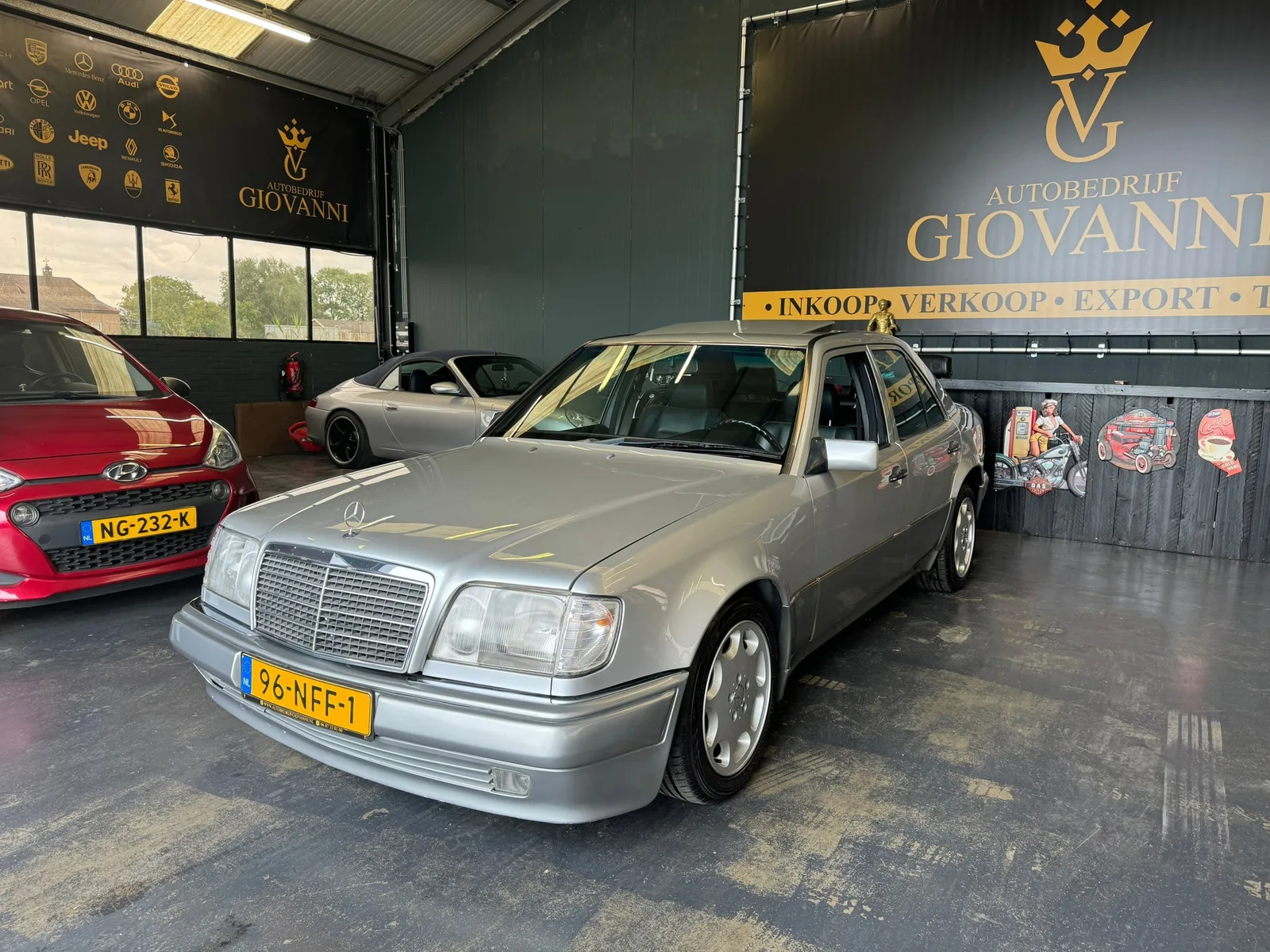 Mercedes-Benz 200-500 (1991) — foto 1