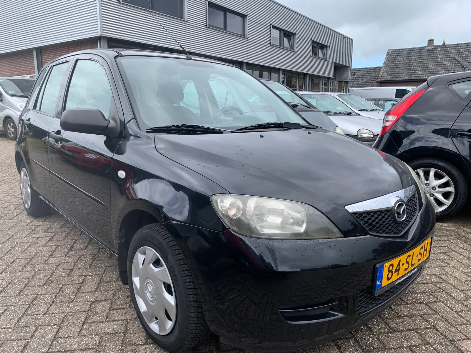 Mazda 2 (2006) — foto 1