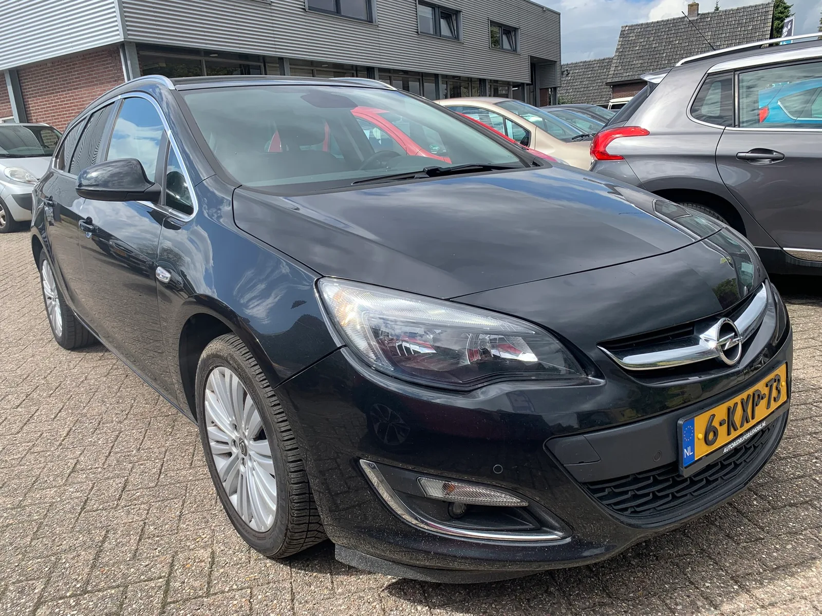 Opel Astra Sports Tourer (2013) — foto 1