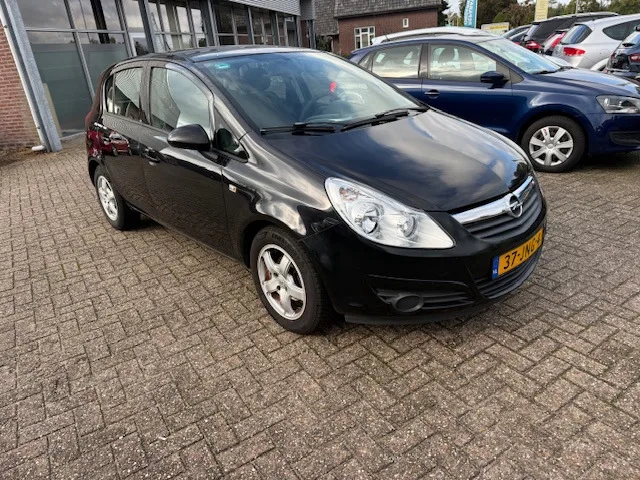 Opel Corsa (2009) — foto 1