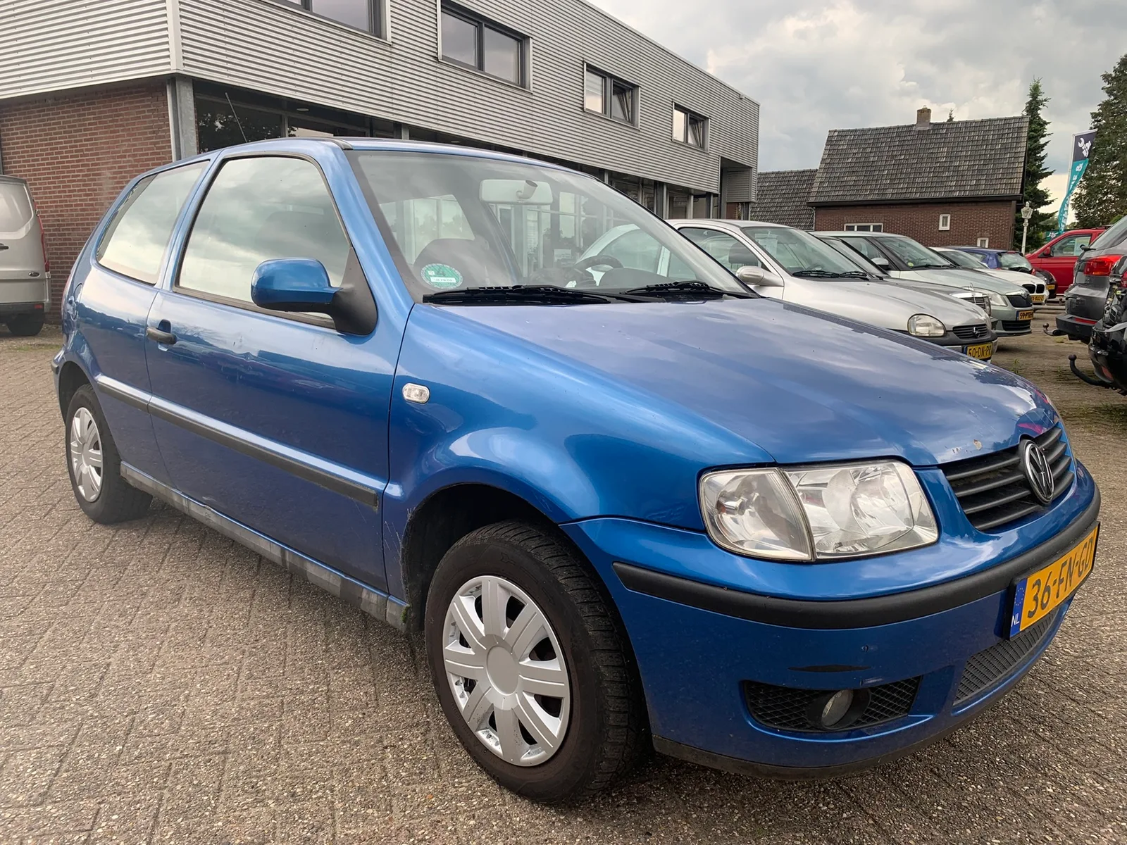 Volkswagen Polo (2000) — foto 1