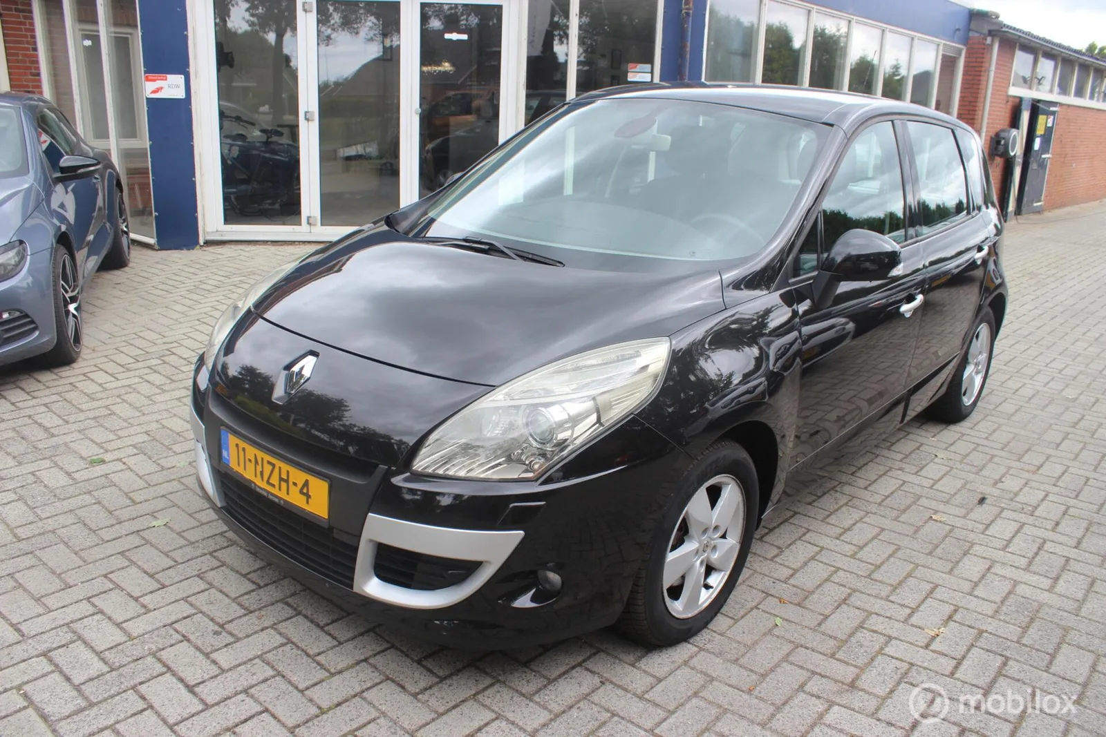 Renault Scénic (2011) — foto 1