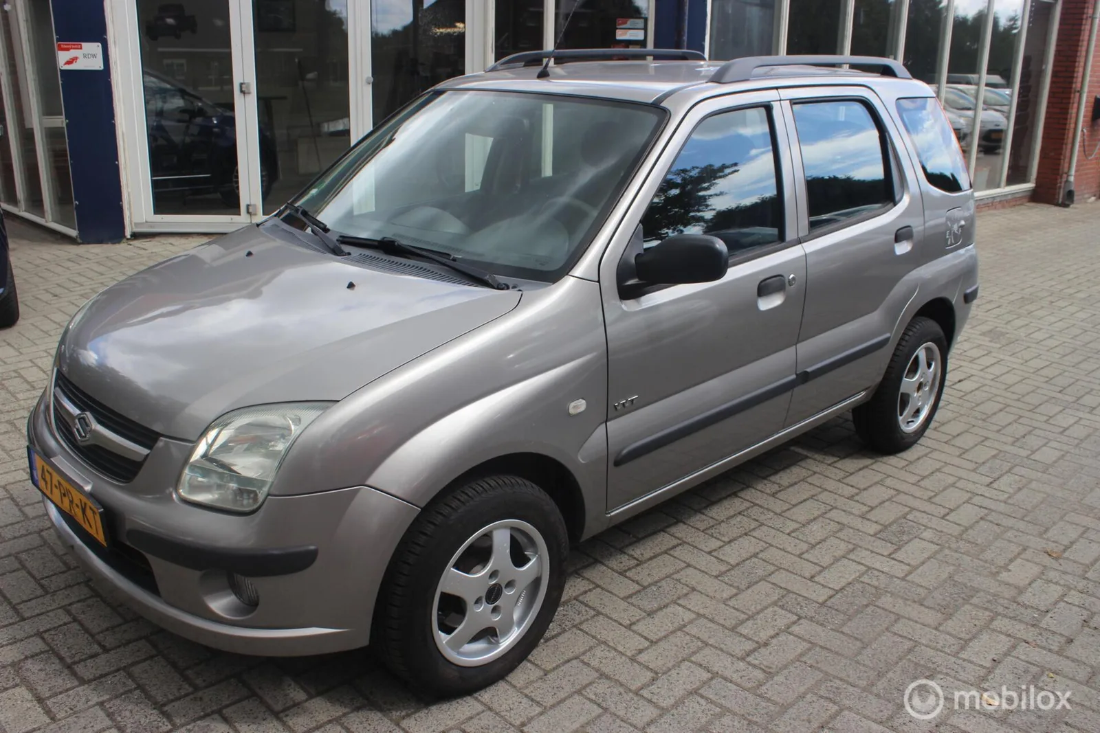 Suzuki Ignis (2004) — foto 1