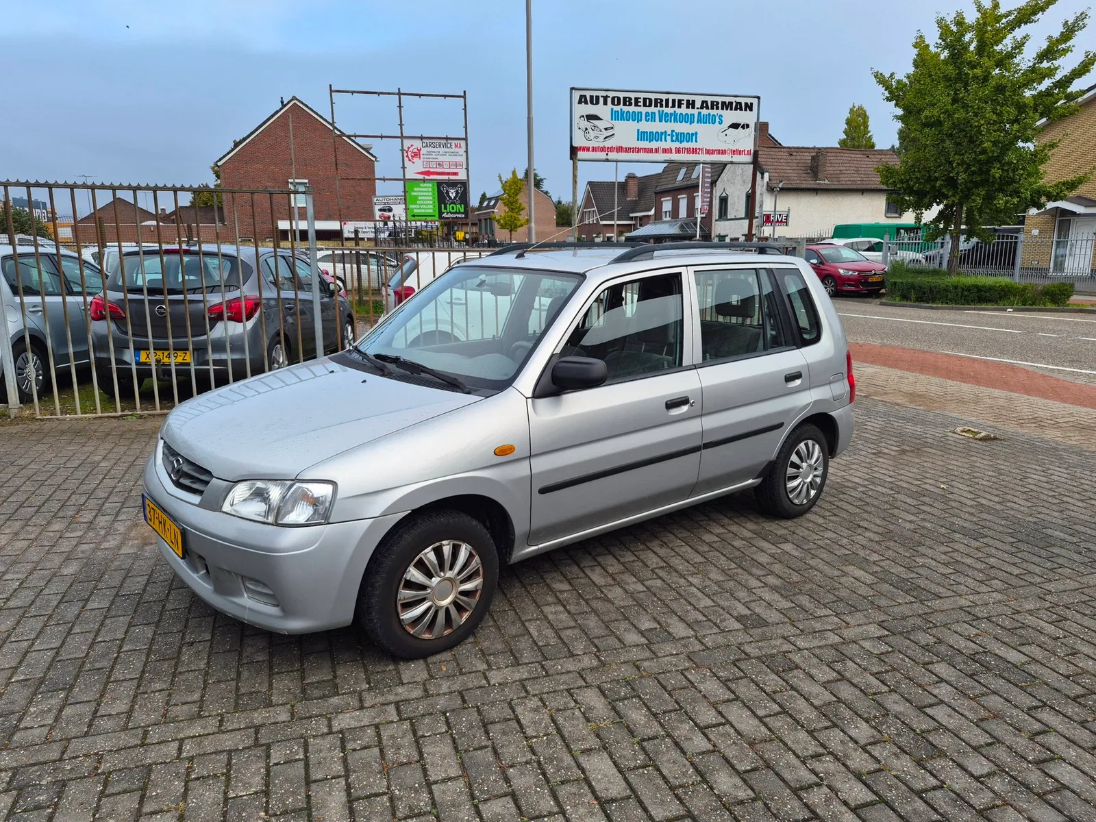 Mazda Demio (2001) — foto 1