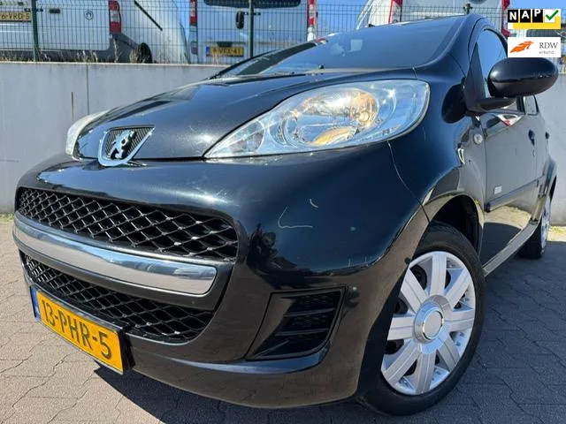 Peugeot 107 (2011) — foto 1