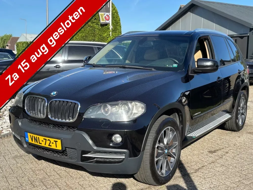 BMW X5 (2009) — foto 1