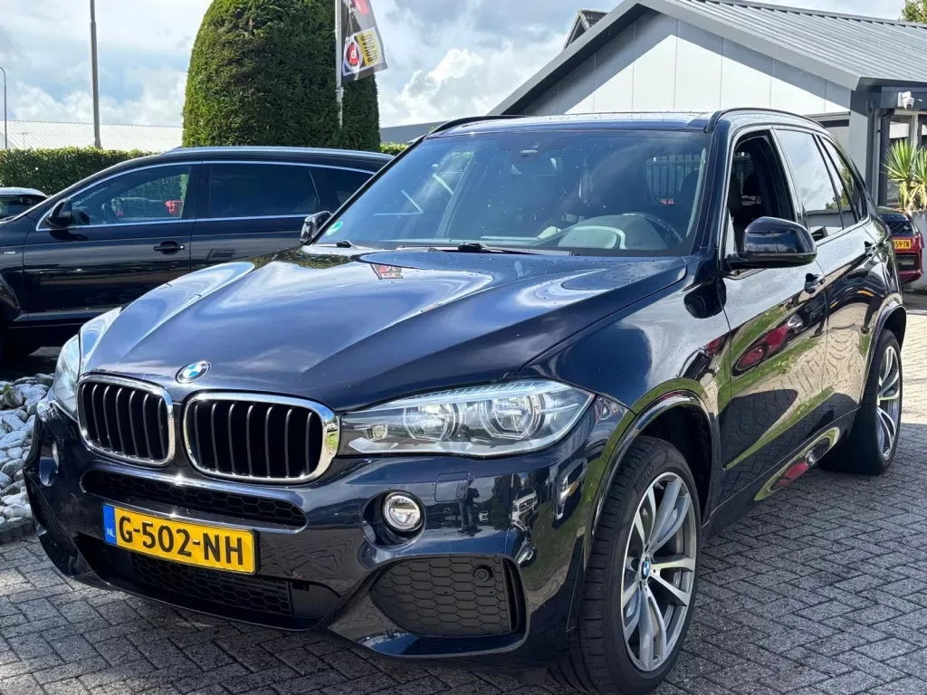 BMW X5 (2014) — foto 1