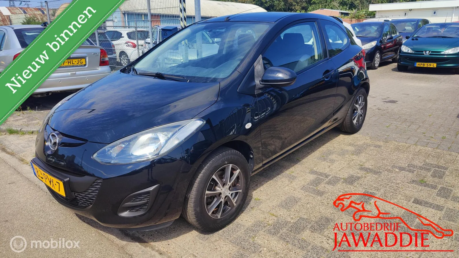 Mazda 2 (2011) — foto 1