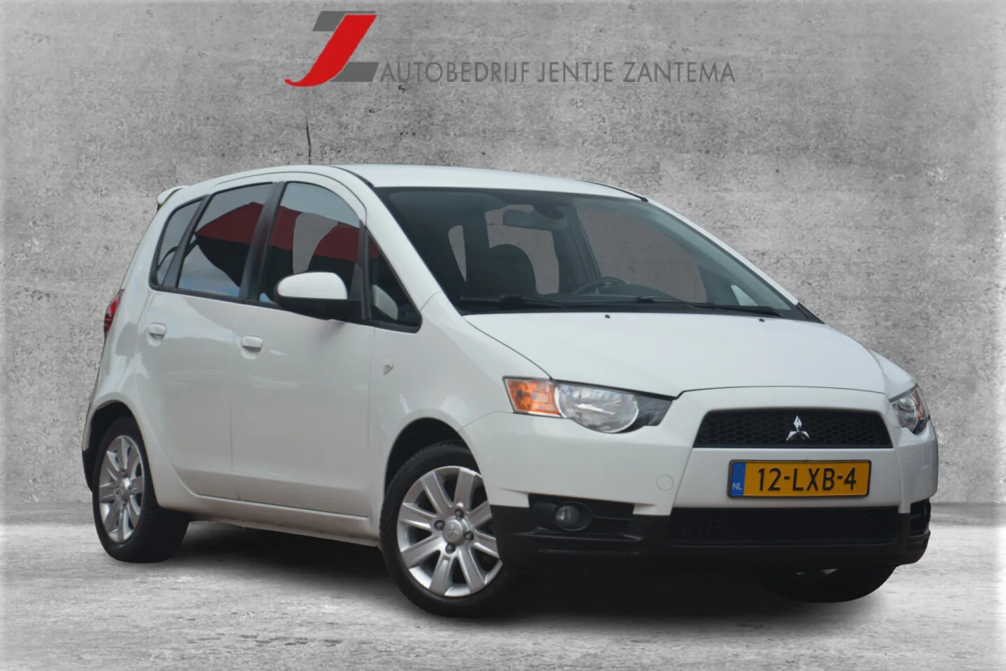 Mitsubishi Colt (2010) — foto 1