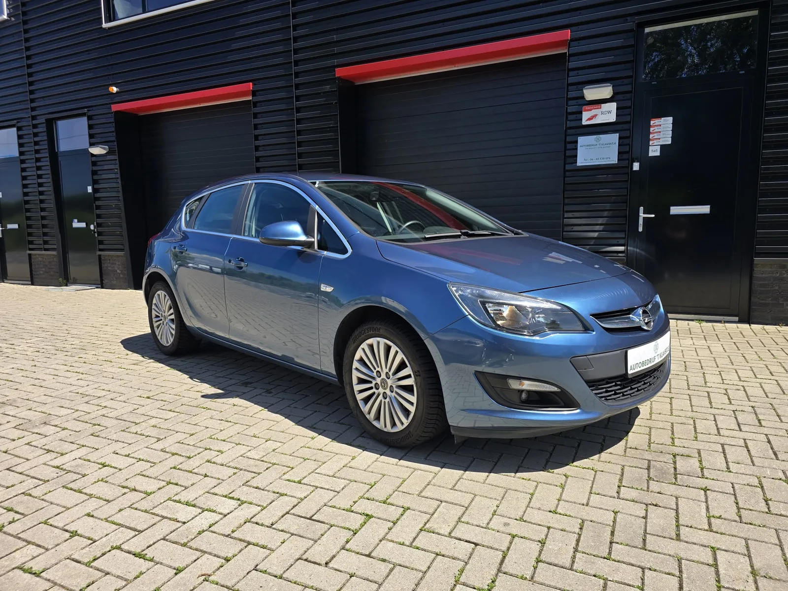 Opel Astra (2014) — foto 1