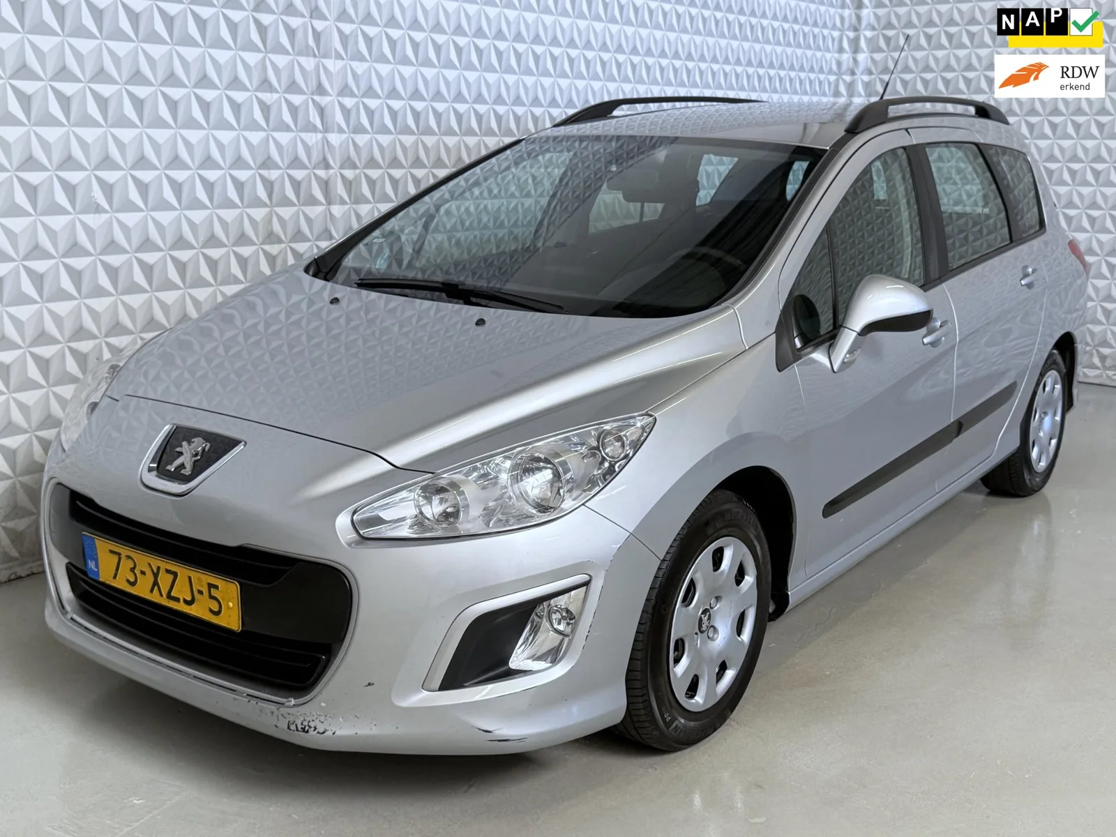Peugeot 308 (2012) — foto 1