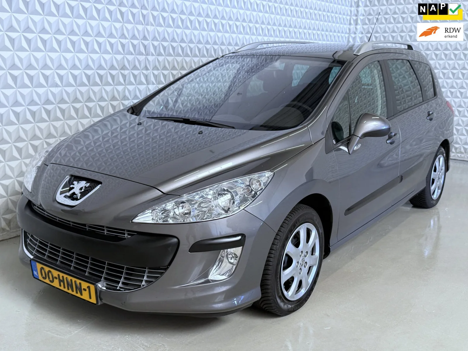 Peugeot 308 (2009) — foto 1