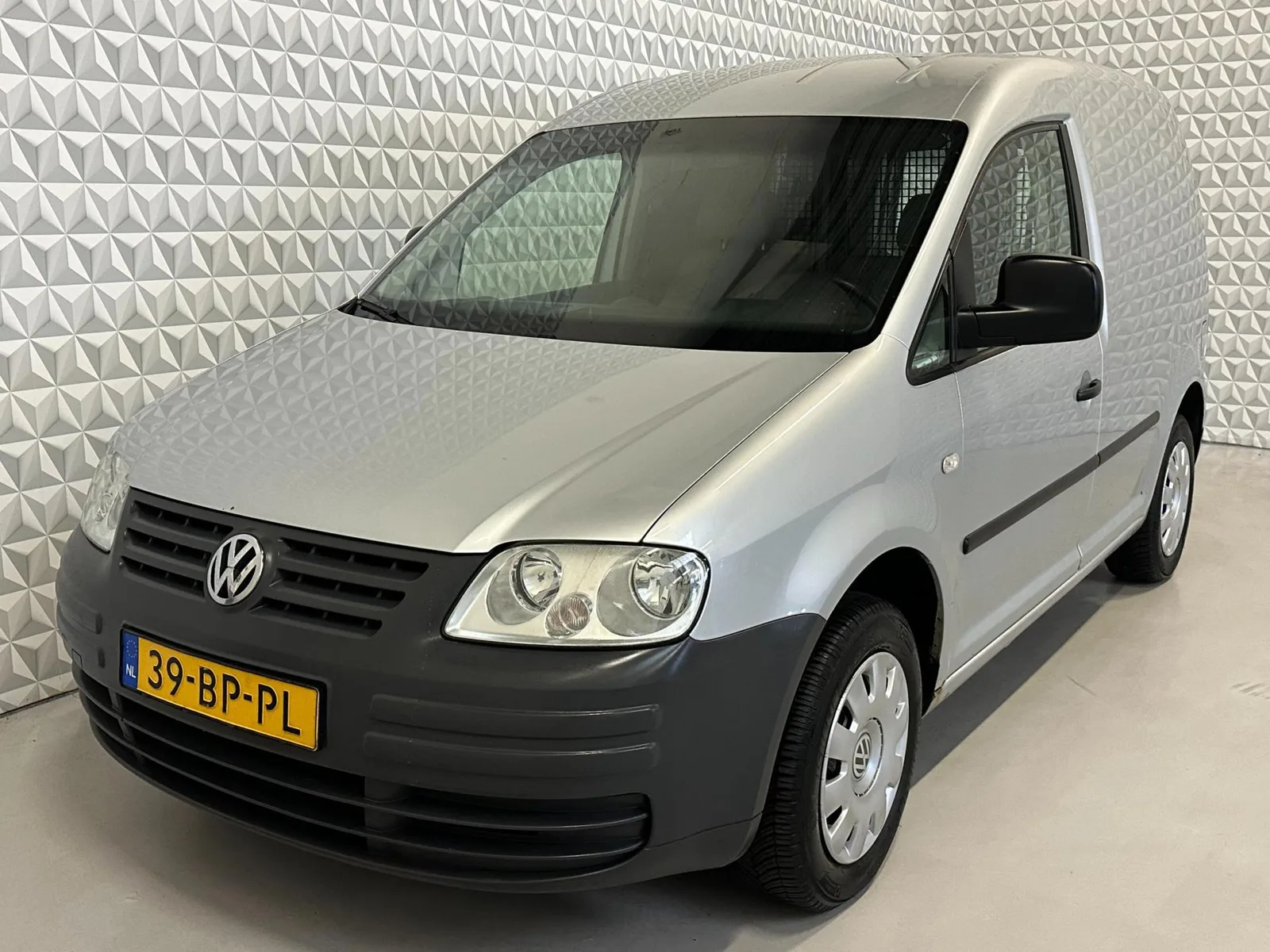 Volkswagen Caddy (2004) — foto 1