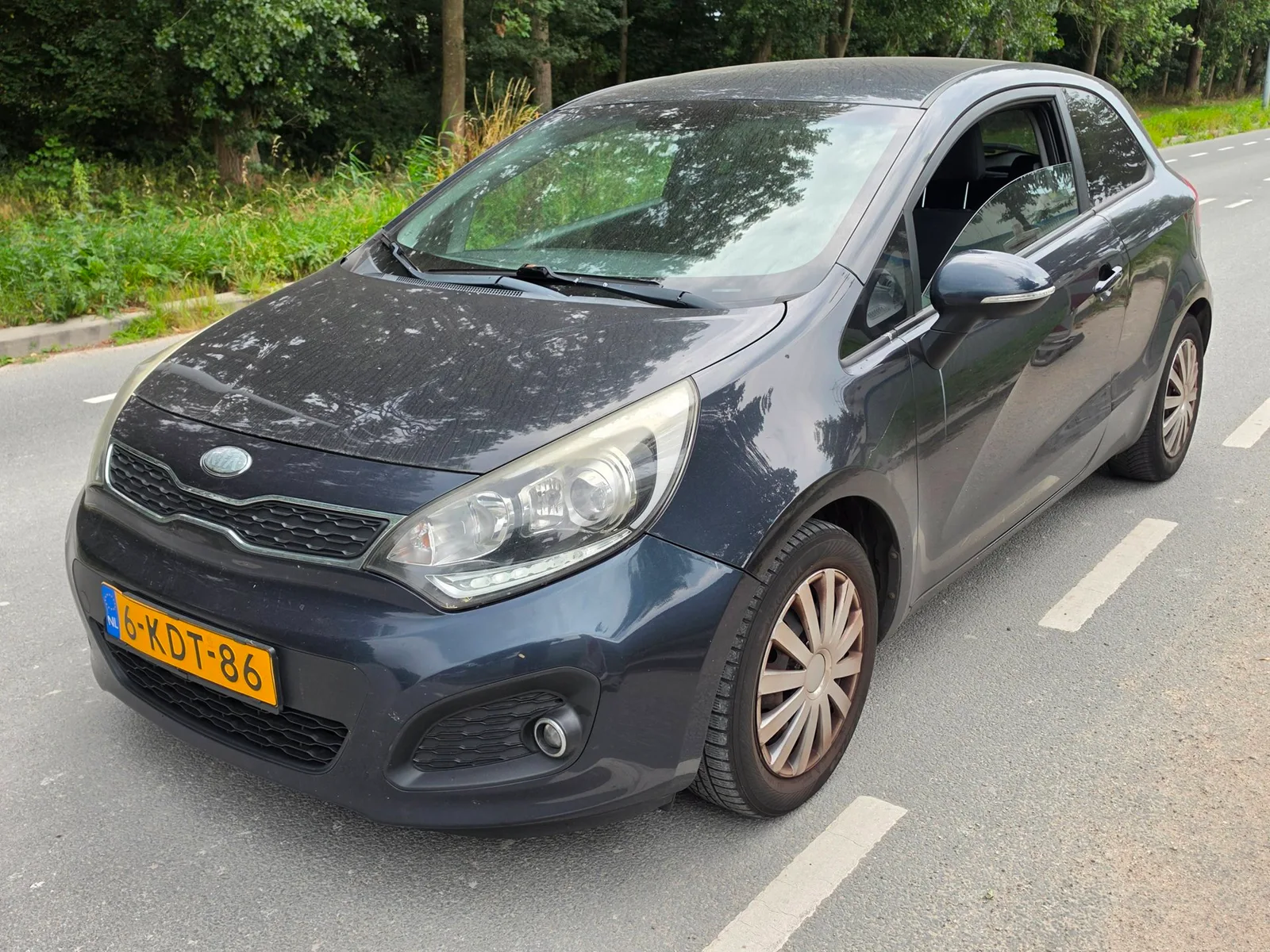 Kia Rio (2013) — foto 1