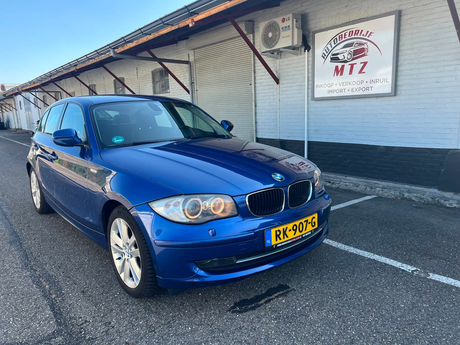 BMW 1-Serie (2011) — foto 1