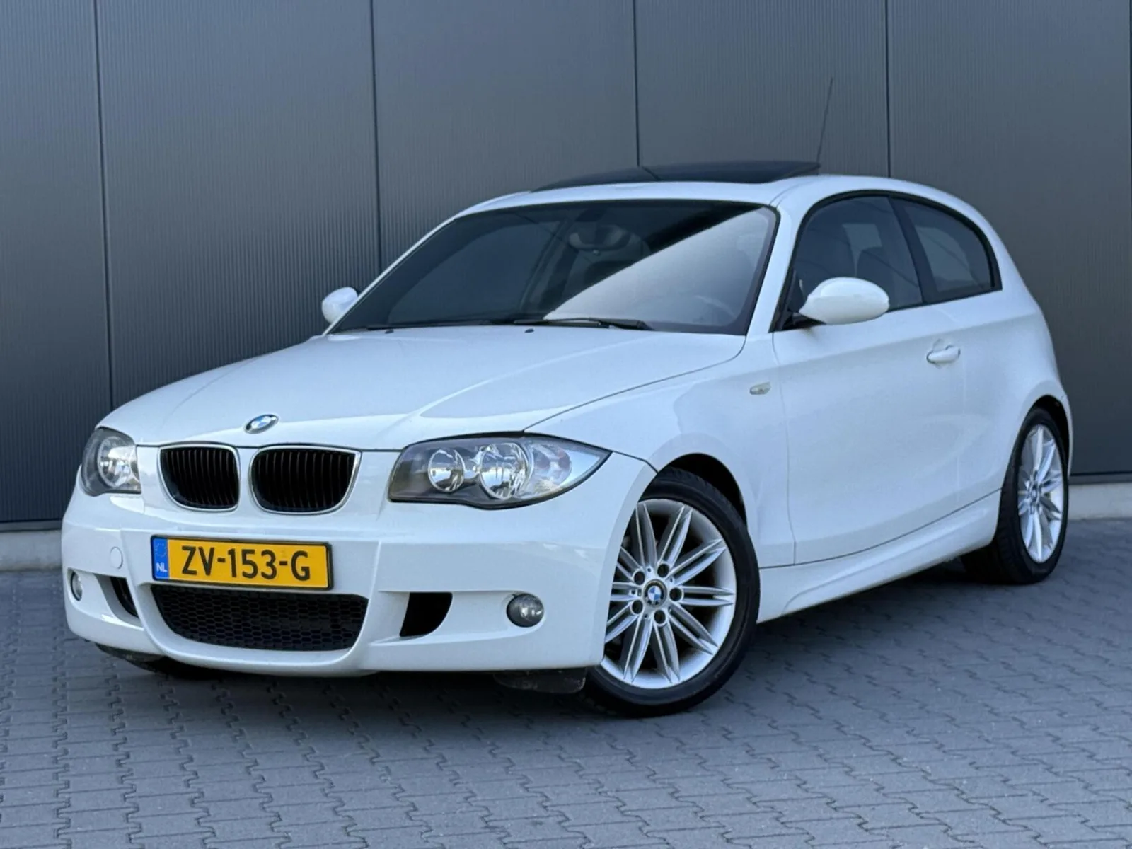 BMW 1-Serie (2008) — foto 1