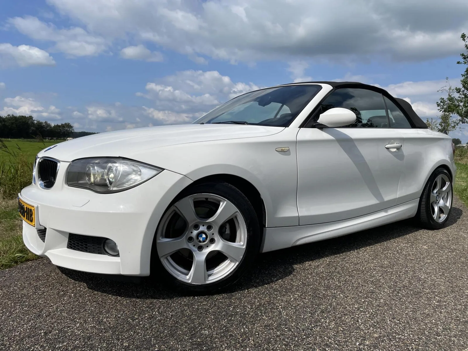 BMW 1-Serie (2009) — foto 1