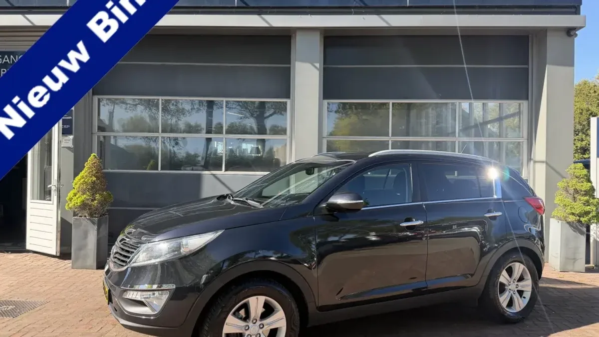 Kia Sportage (2012) — foto 1