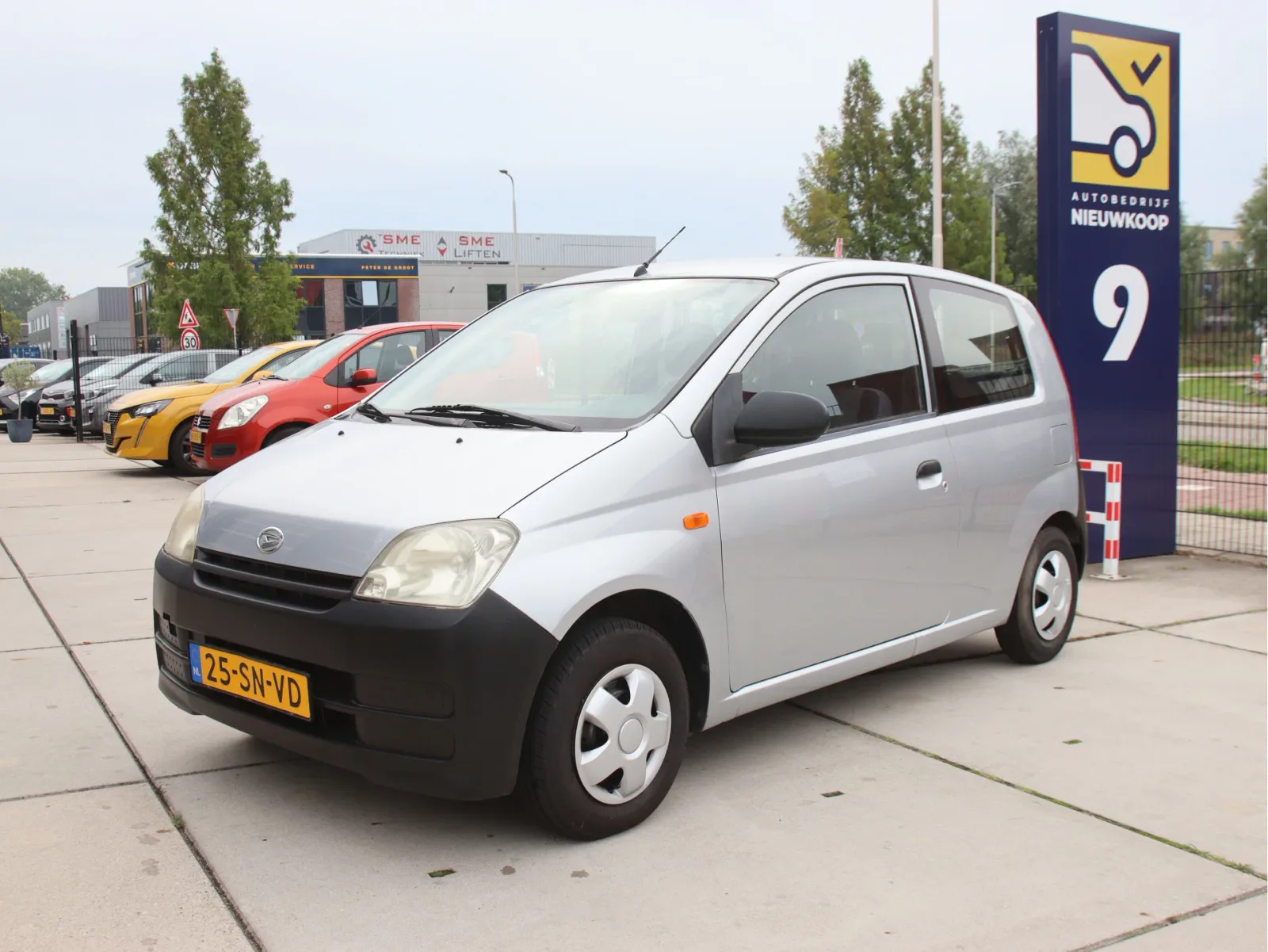 Daihatsu Cuore (2006) — foto 1