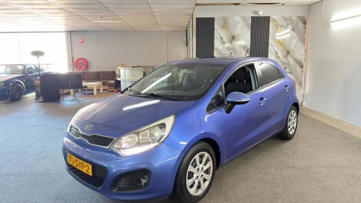 Kia Rio (2011) — foto 1