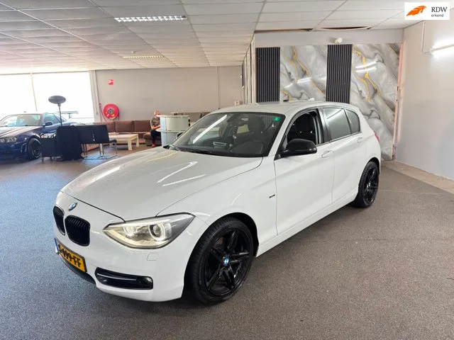BMW 1-Serie (2011) — foto 1
