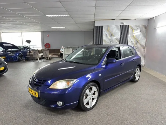 Mazda 3 (2004) — foto 1