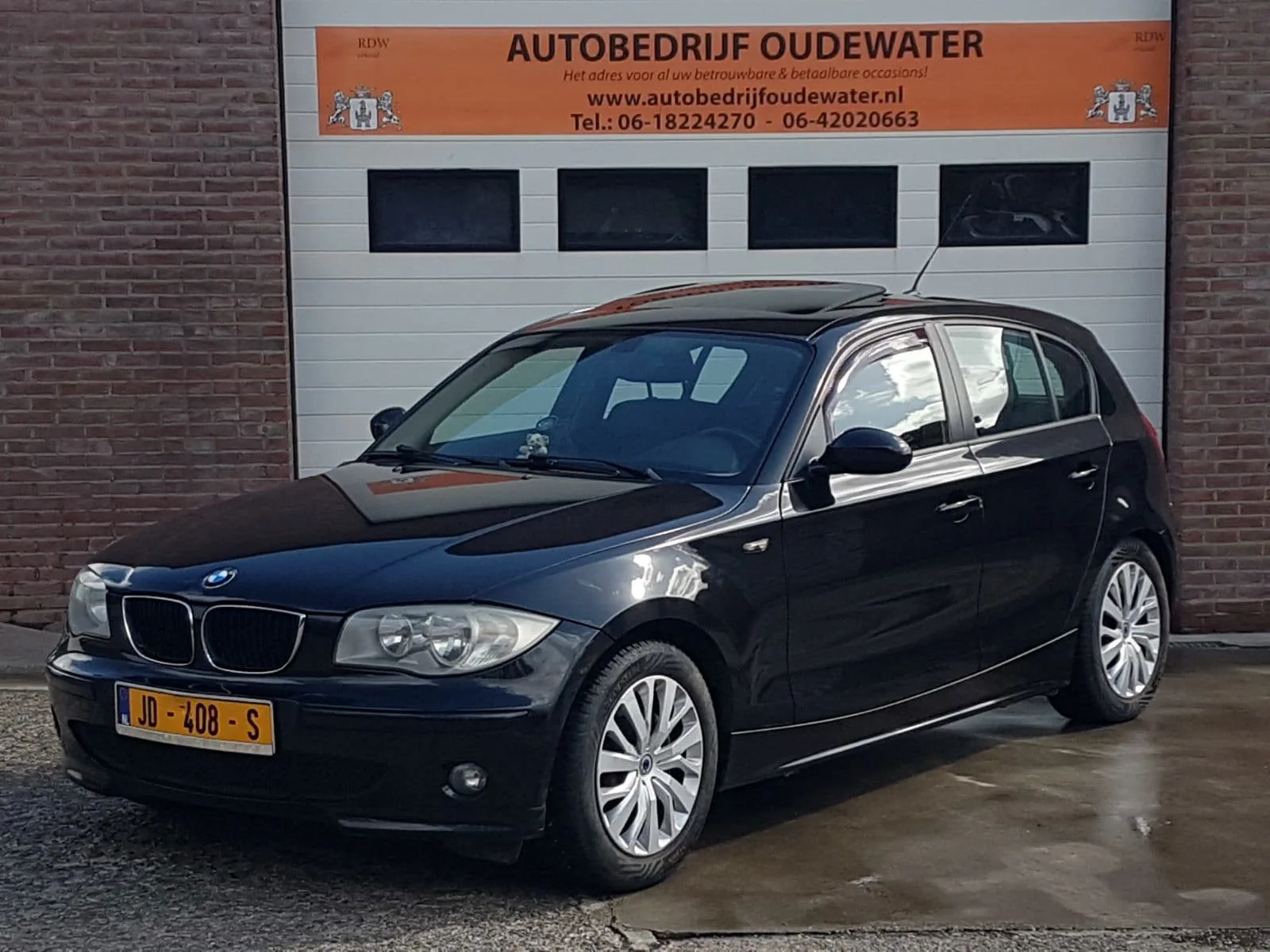 BMW 1-Serie (2006) — foto 1
