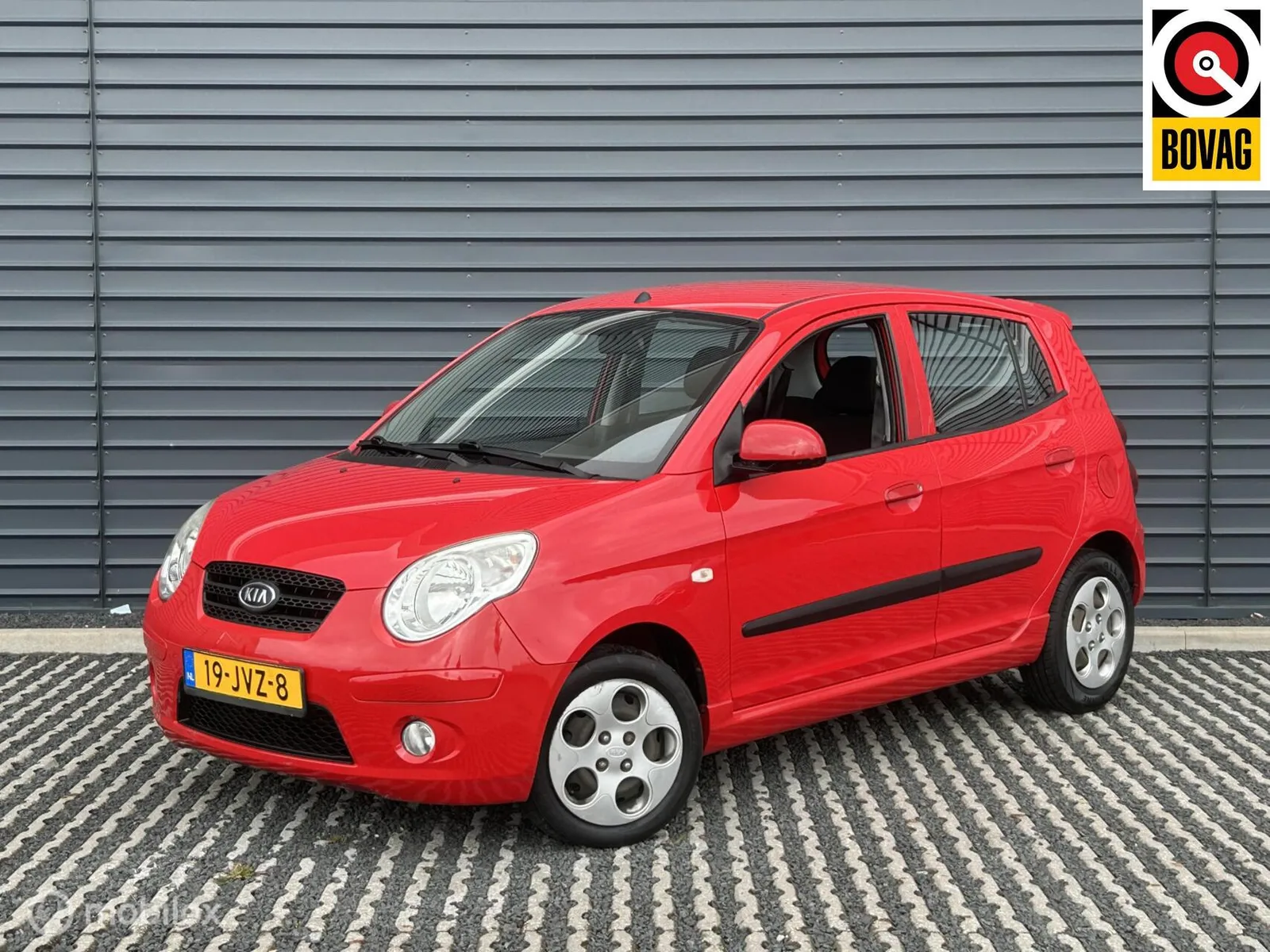 Kia Picanto (2009) — foto 1