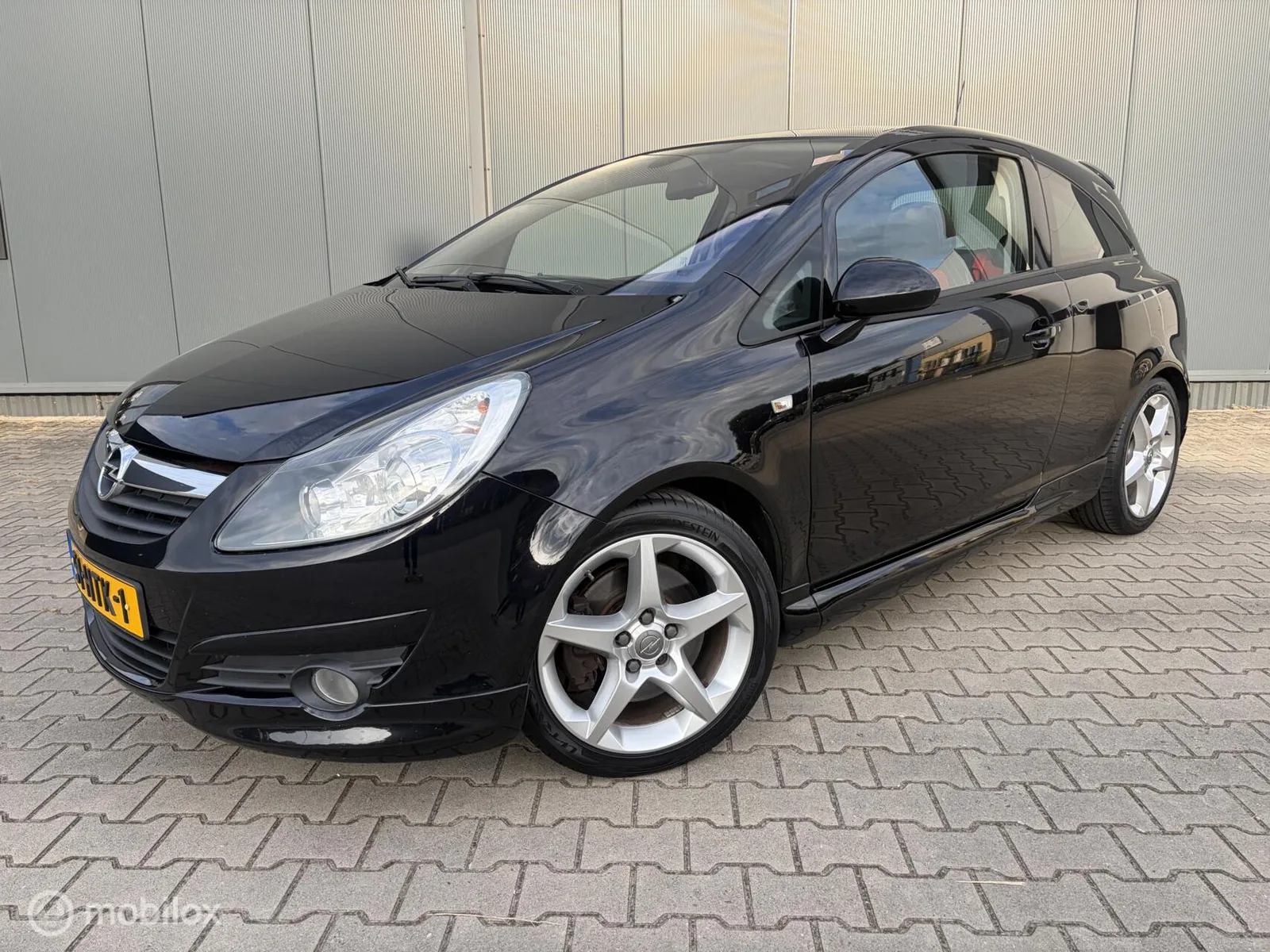 Opel Corsa (2009) — foto 1