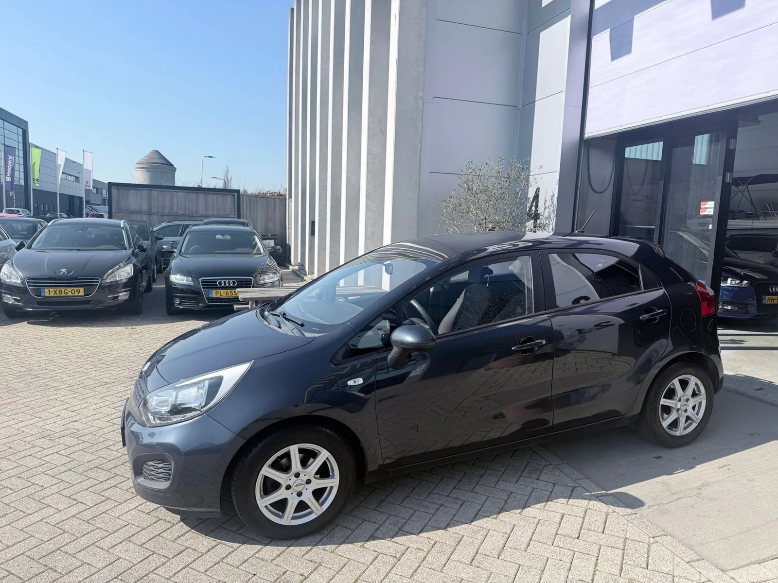 Kia Rio (2014) — foto 1