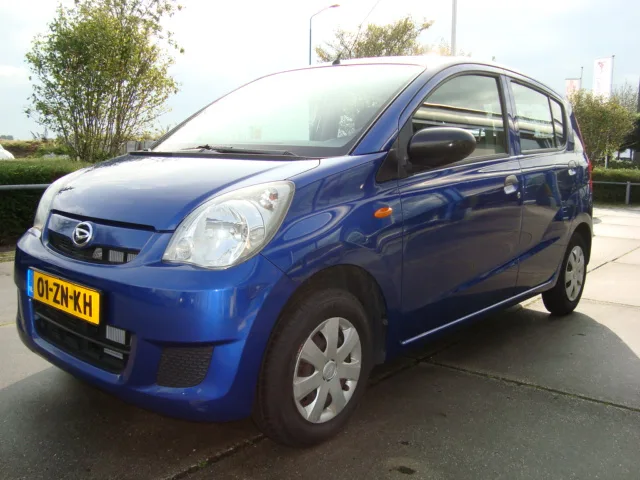 Daihatsu Cuore (2008) — foto 1
