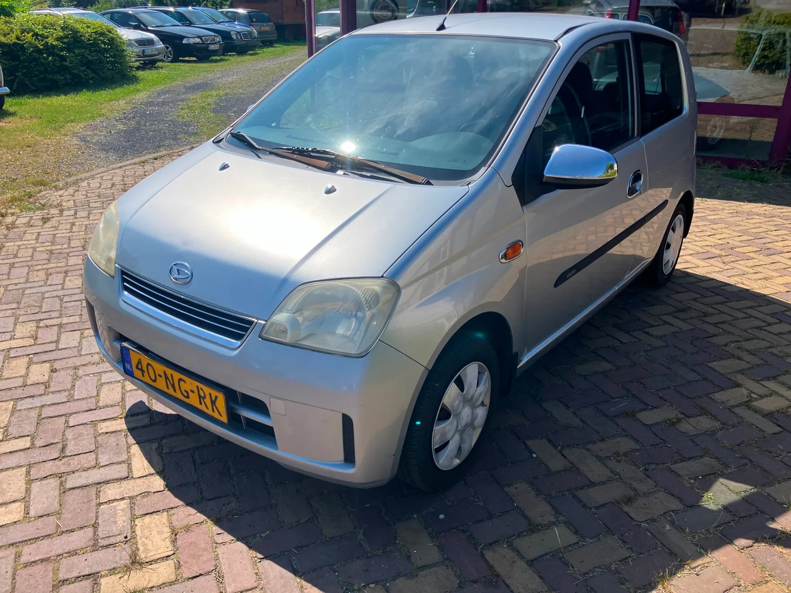 Daihatsu Cuore (2003) — foto 1