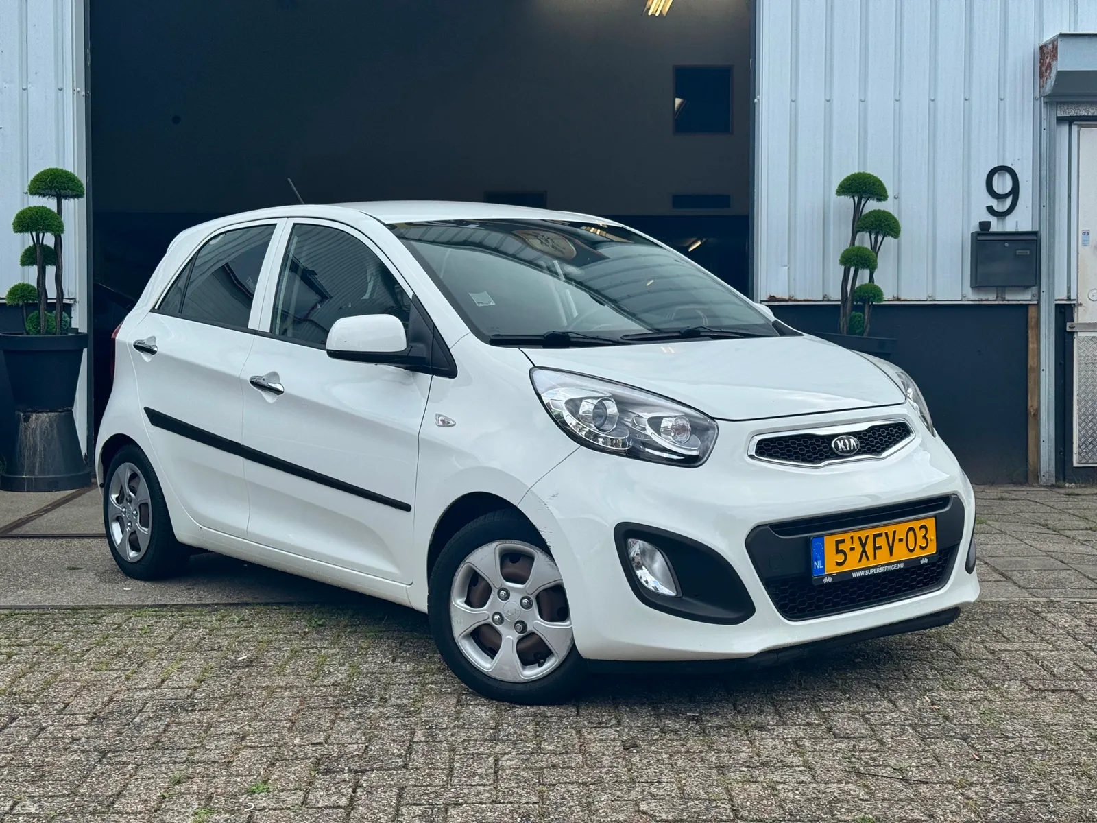 Kia Picanto (2014) — foto 1