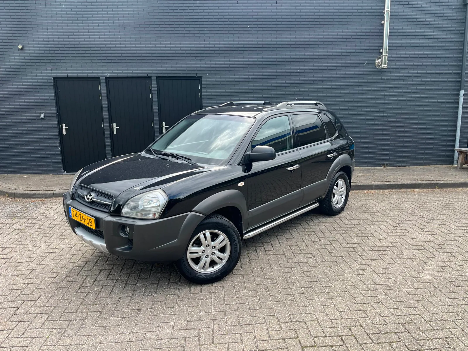 Hyundai Tucson (2008) — foto 1