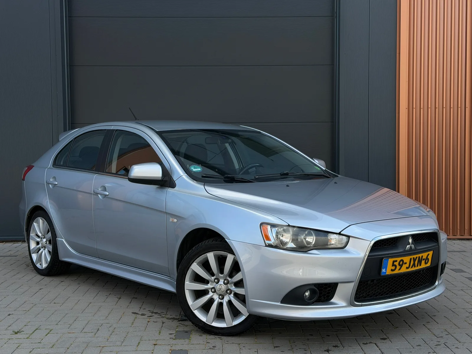 Mitsubishi Lancer (2009) — foto 1