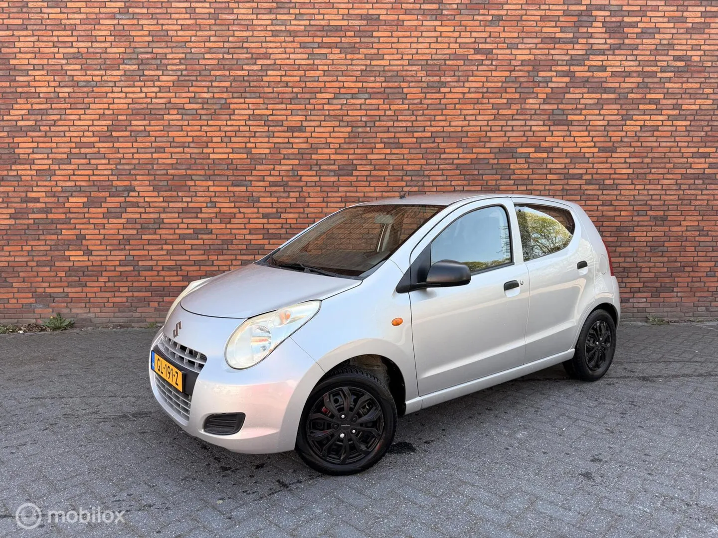 Suzuki Alto (2011) — foto 1