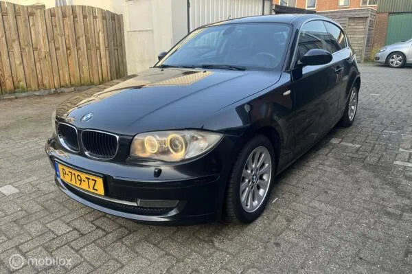 BMW 1-Serie (2009) — foto 1