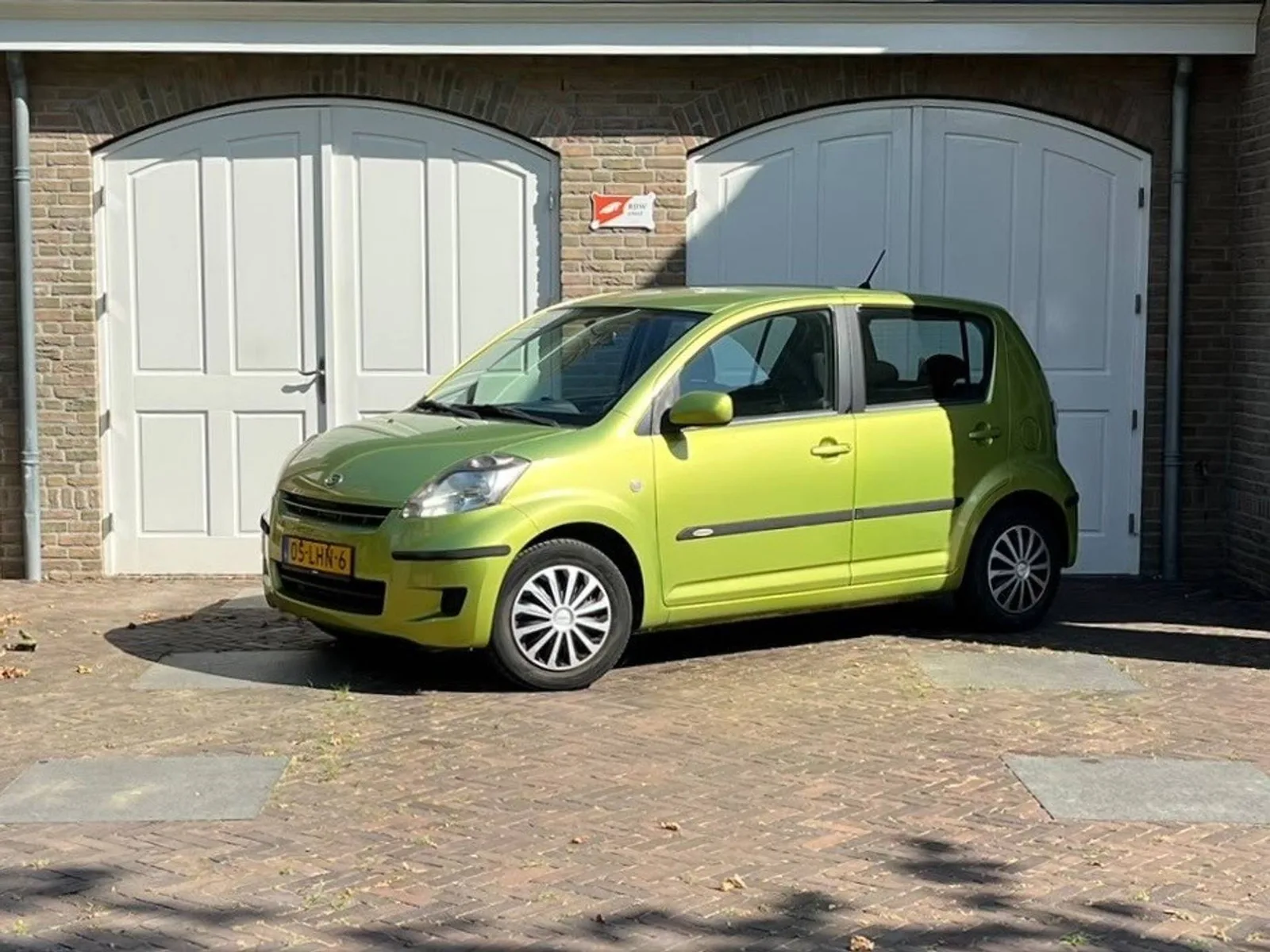 Daihatsu Sirion (2010) — foto 1