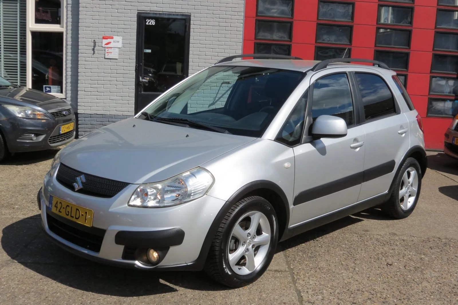 Suzuki SX4 (2008) — foto 1