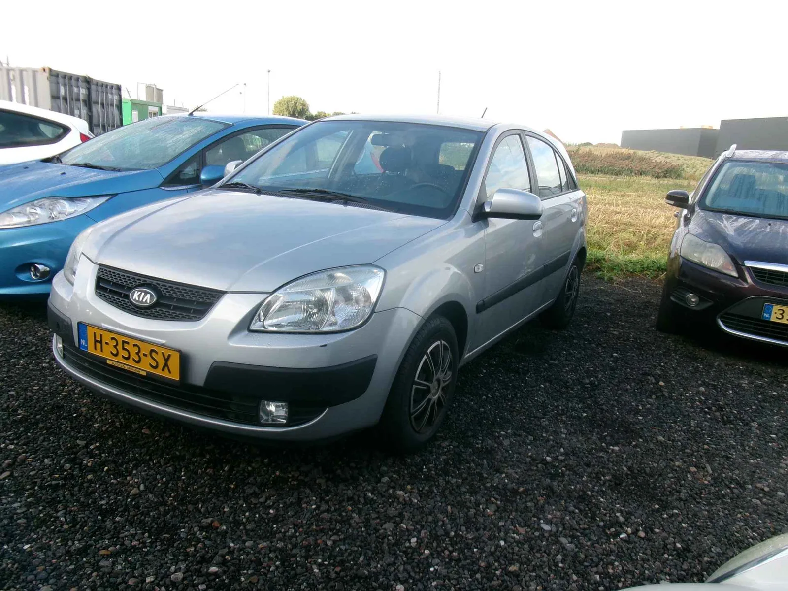 Kia Rio (2009) — foto 1