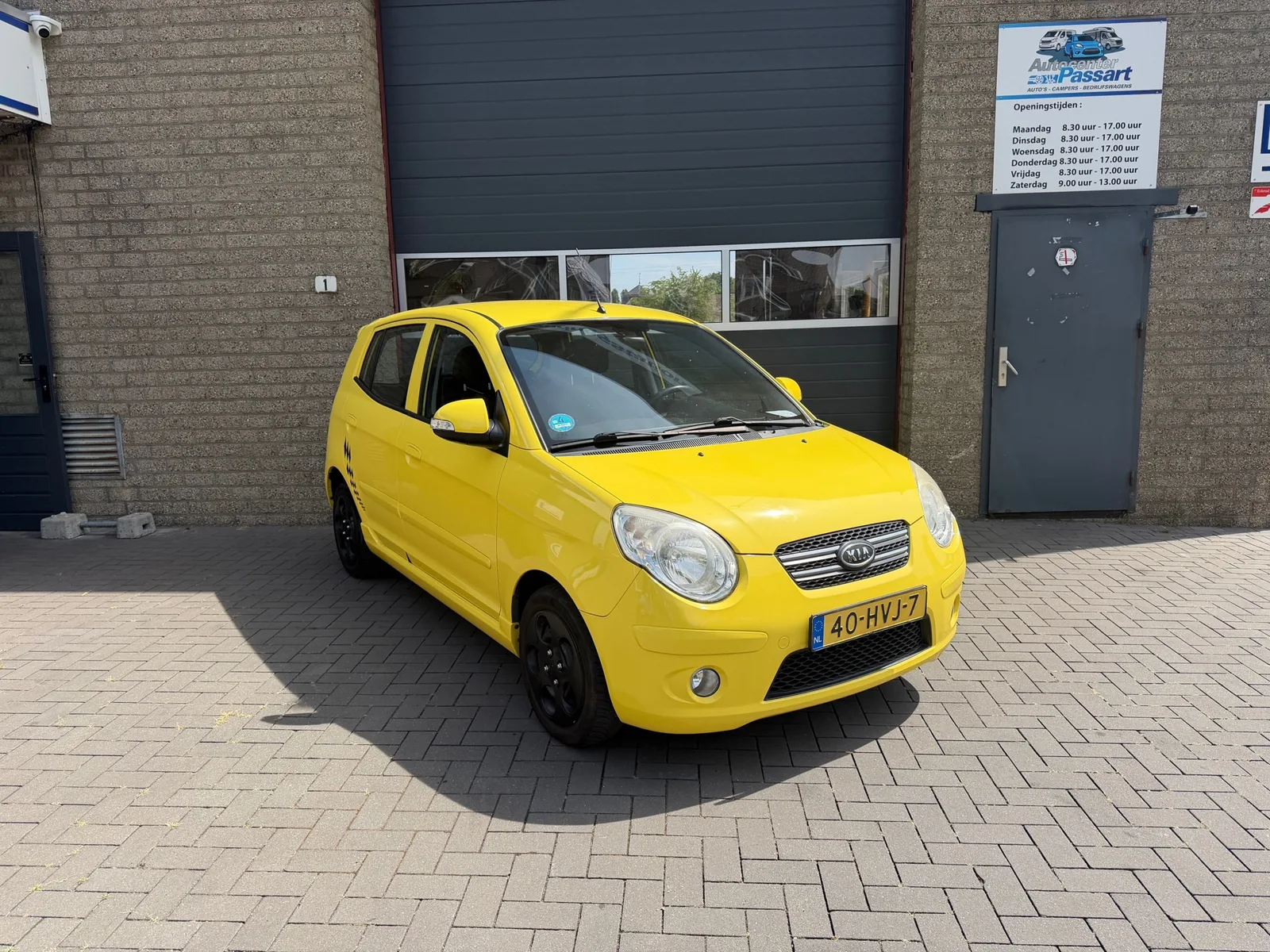 Kia Picanto (2009) — foto 1