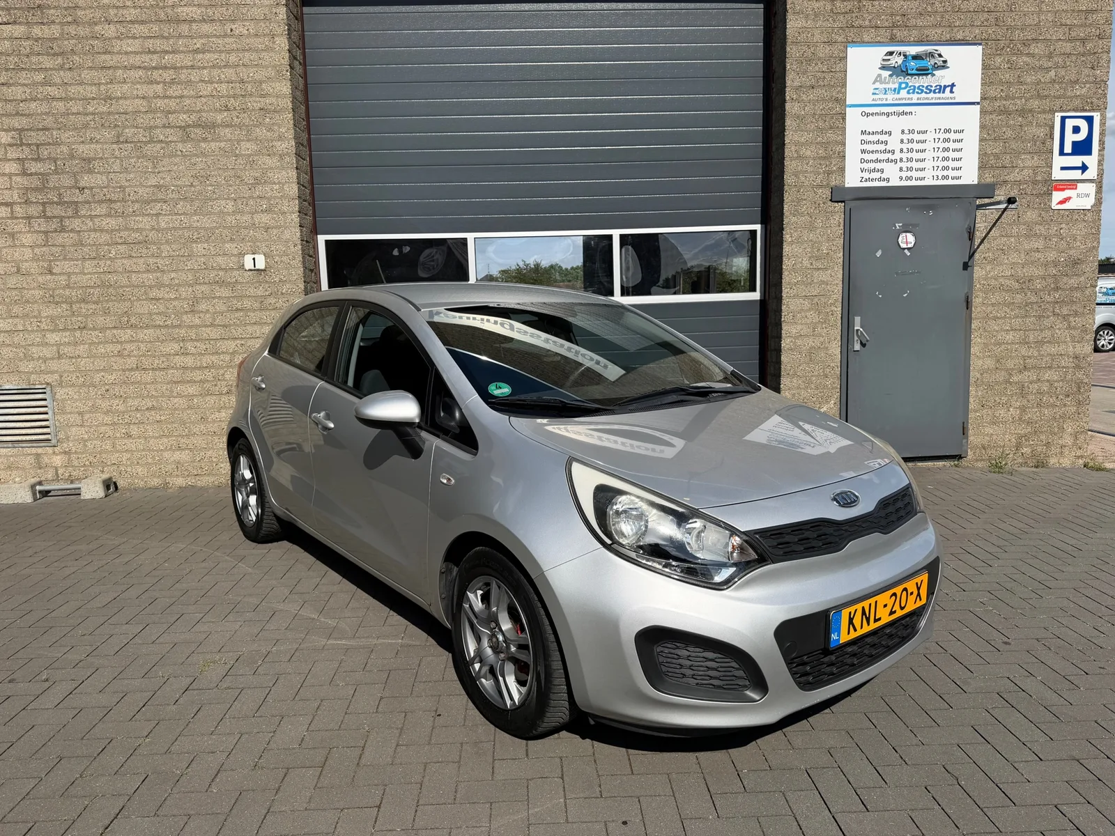 Kia Rio (2011) — foto 1