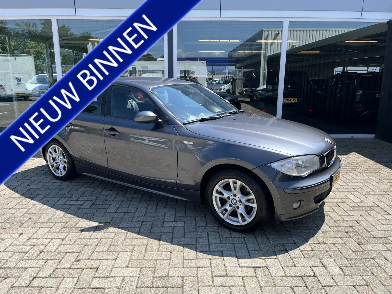 BMW 1-Serie (2006) — foto 1