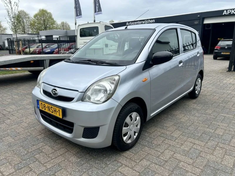Daihatsu Cuore (2010) — foto 1