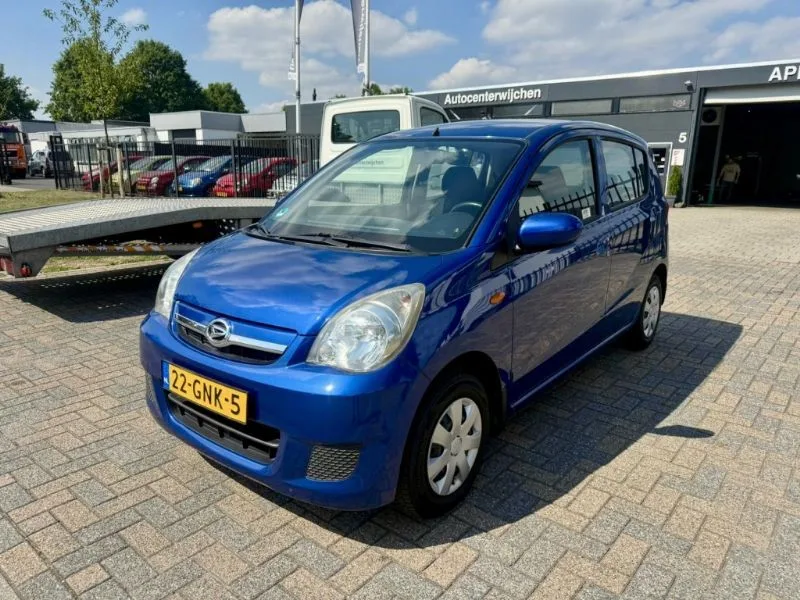 Daihatsu Cuore (2008) — foto 1