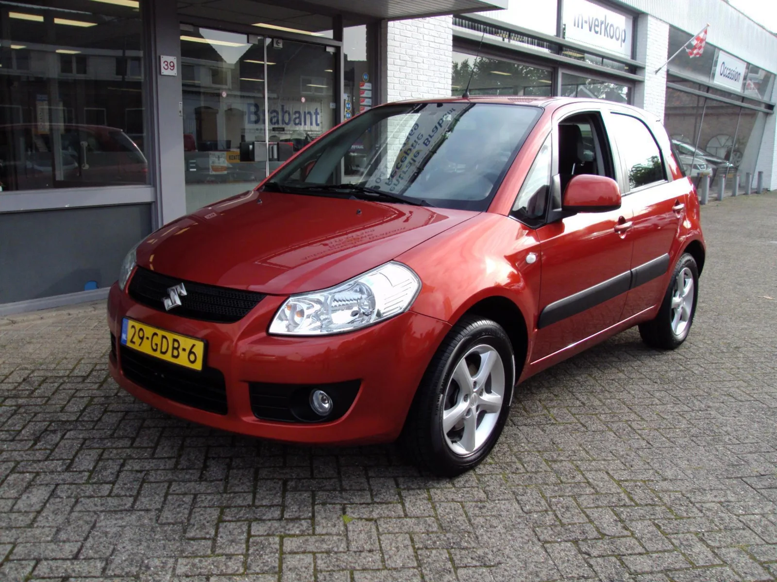 Suzuki SX4 (2008) — foto 1