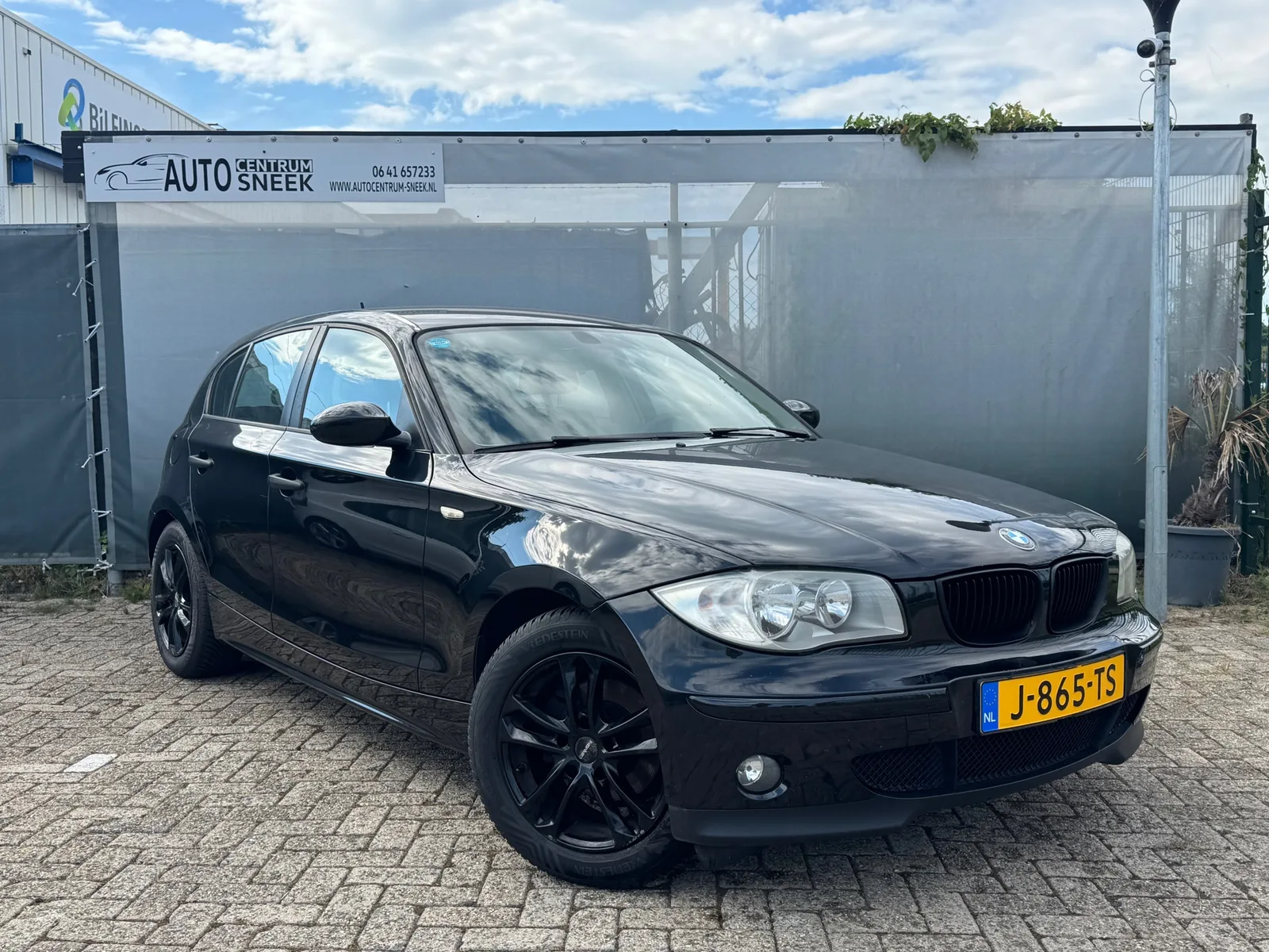 BMW 1-Serie (2006) — foto 1