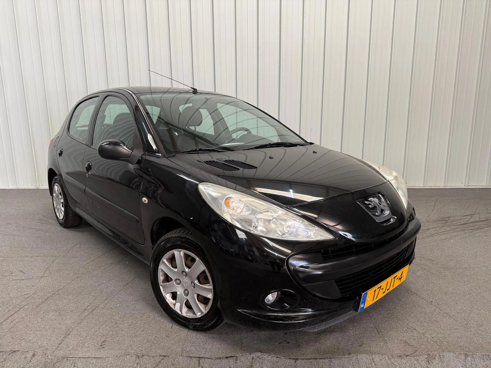 Peugeot 206 (2009) — foto 1
