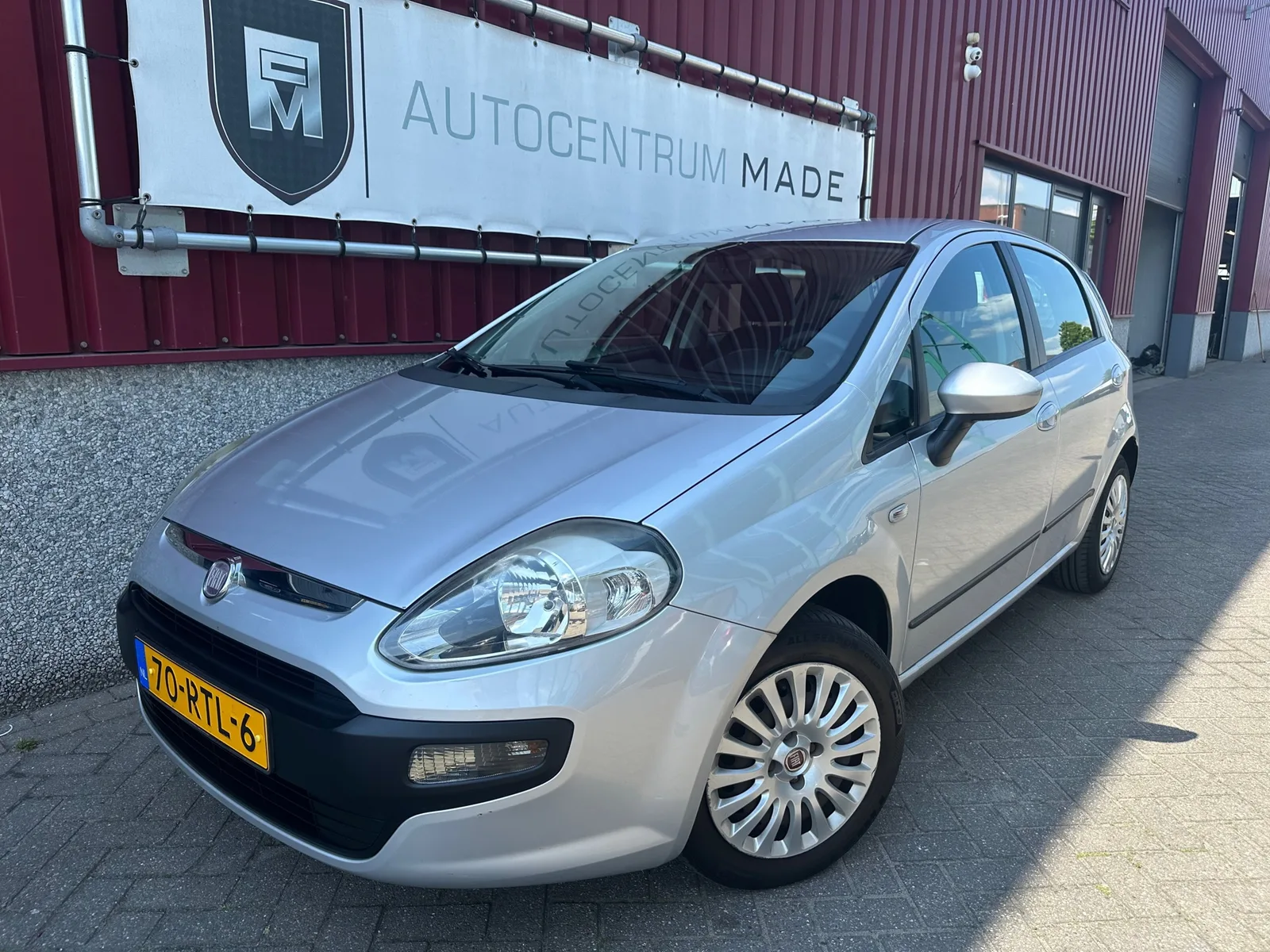 Fiat Punto (2011) — foto 1