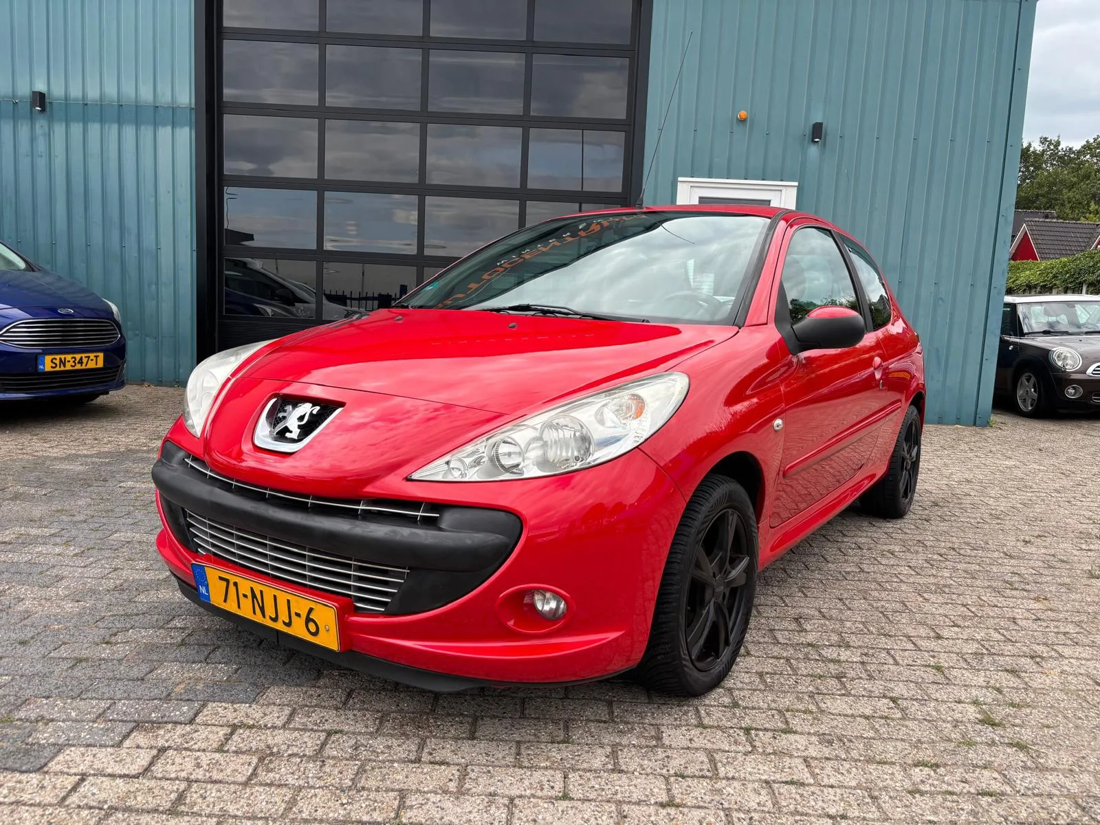 Peugeot 206 (2010) — foto 1